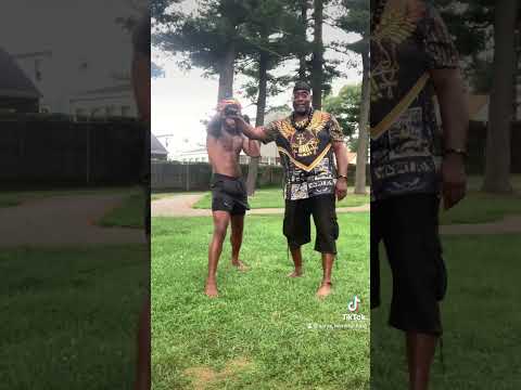 Teaching a Young Man the Proper Boxing Stands with Punching.