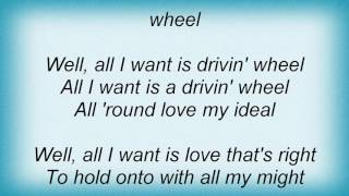 Emmylou Harris - Drivin&#39; Wheel Lyrics