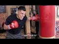 ADRIAN GRANADOS SHOWS YOU HOW A PRO BOXER HITS THE HEAVY BAG WITH POWERFUL COMBOS
