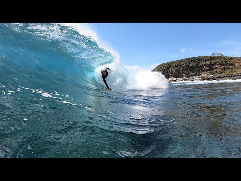 Bodyboarders ripping heavy slab at Mudjimba Island