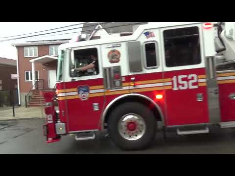 FDNY Tower Ladder 152 taking up from a 10-75 All Hands Fire in a detached garage