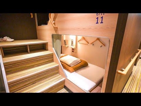 , title : '15-Hour Solo Travel Adventure: Osaka to Kagoshima on a Ferry Capsule Hotel in Japan'
