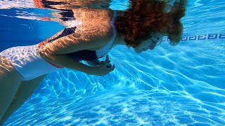 Carla Underwater - swimming with a white bathing s