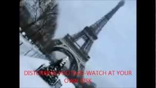 MAN JUMPS OFF EIFFEL TOWER---HOMME SAUTER TOUR EIFFEL!