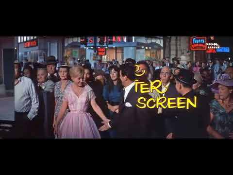 Trailer moment: city street bustle suggesting the show’s switchboard-and-city heartbeat