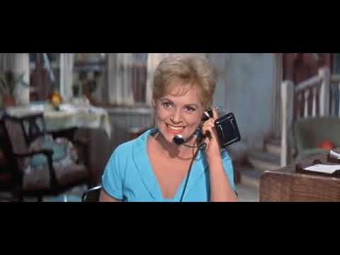 Vintage trailer art for the 1960 film version of Bells Are Ringing with Judy Holliday and Dean Martin