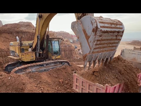 Caterpillar 365C Excavator Loading Mercedes & MAN Trucks