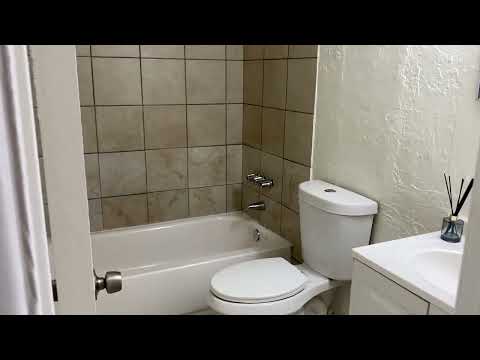 Apartment bathroom — representative home at 12 Palms Apartments.