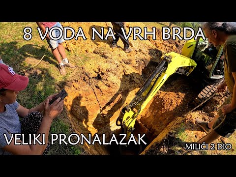 DRILLING A WELL WITH A THE EXCAVATOR ON THE TOP OF THE HILL OF 8 SPRINGS