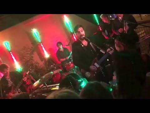 Bob Schneider introduces the band during Tatantula at the Tripcase party at SXSW 2016
