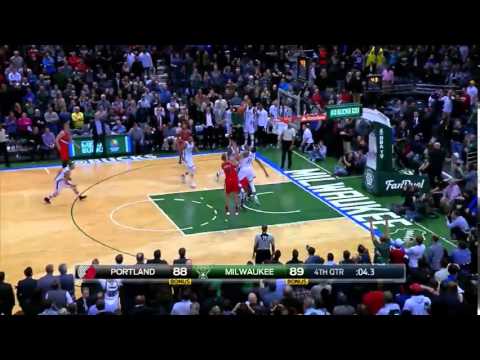 John Henson blocks Meyers Leonard to secure win