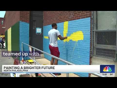 Temple University Police Officers and football players team up to paint nearby school, via NBC10