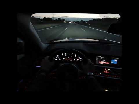 Driving a 2022 BMW 318d on the Autobahn  at Sunset Full Speed Ahead