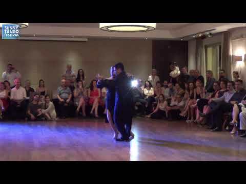  Carlos Espinoza  and  Noelia Hurtado Pitruzzella  are  dancing  to  the  tango  "  Rie Payaso  "  by  Juan D'Arienzo  at  Sunny Tango Festival  in  2019
