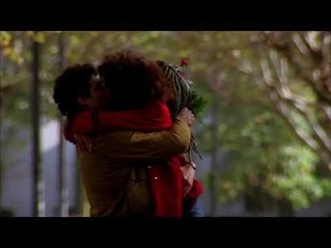 Flashdance trailer frame: nightclub silhouette and spotlight framing a solo dancer