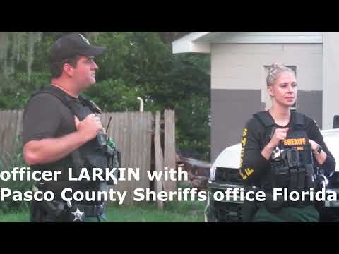 DRIVE BY SECURITY GUARD + Officer LARKIN does better this time & the dog or family didn't get tased.