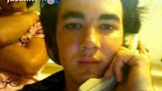 Kevin Staring at himself :) and Joe so cute in background!