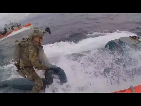 Officer Jumps on Submarine to Bust Alleged Drug Smugglers