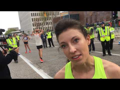 Emma Bates pulls away from field at Amway River Bank Run 25K