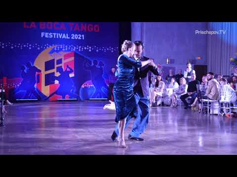  Juan Manuel Rosales  and  Liza Rosales  are  dancing  to  the  vals  "  Dichas Que Vivi  "  by  Rodolfo Biagi  at  La Boca Tango Festival  in  2021
