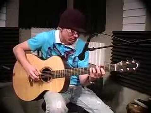 Matt Thomas playing a McGowan guitar