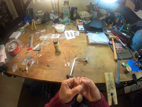 How to string a jeweler saw.