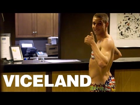 Checking Into a Hotel Wearing Only Stickers: KING OF THE ROAD - Shirtless in Seattle (Clip)