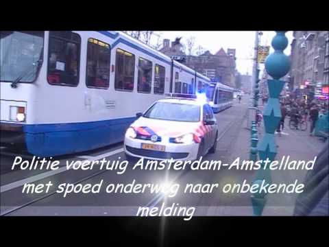 Politie voertuig Amsterdam-Amstelland met spoed onderweg naar onbekende melding