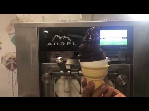 Vanilla Ice Cream Cone dipped in Chocolate Hard Shell