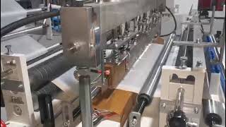 Máy làm túi cuộn luồn dây tự động