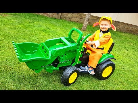 Paw patrol unboxing and assembling power wheels Tractor