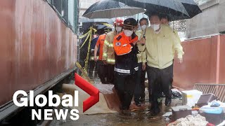 Record rainfall in South Korea floods streets of Seoul, killing at least 8