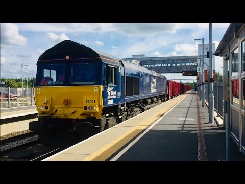 Class 66 66091 (direct rail services) passing Market Harborough with heavy goods