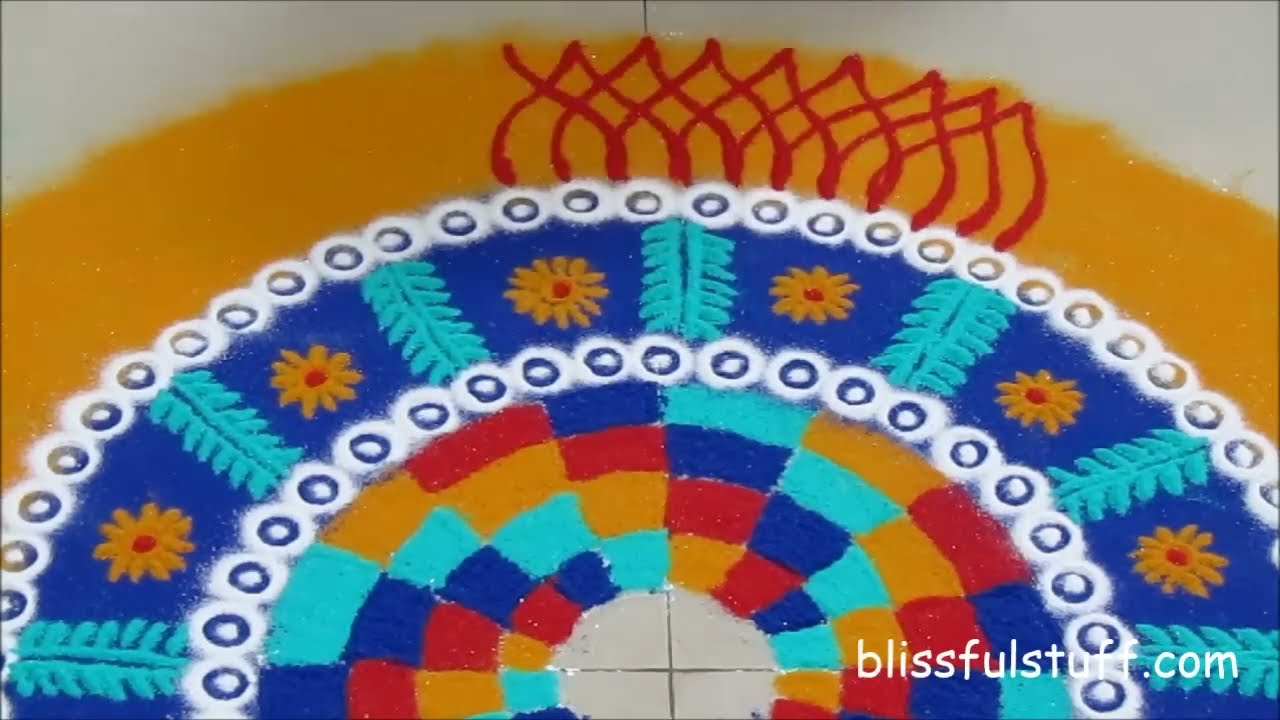 beautiful and unique multicolored rangoli design by poonam borkar