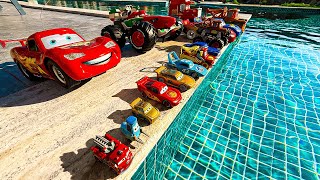 Disney Pixar Cars falling into deep pool, Lightning McQueen, Tow Mater, Mack, Sally, Francesco