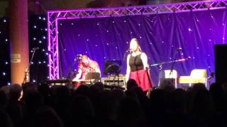 Sarah Ribbands and Jonny Miller performing 'Rather Be' live on stage