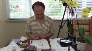 Henry Li Carving an Artist Name Seal for Kong Gaoling (Gail Cunningham)
