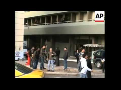 Aftermath of attack by youths on Athens police building