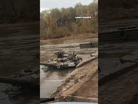 Russian tank destroyed by Ukrainian soldiers on a pontoon crossing #warinukraine #tanks #russia
