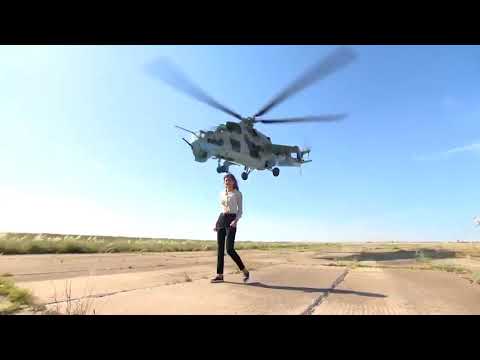 Azerbaijan military helicopter flies too close to journalist