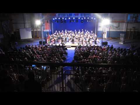 Pihalni orkester Šentjur in glasen aplavz publike ob zaključku koncerta.