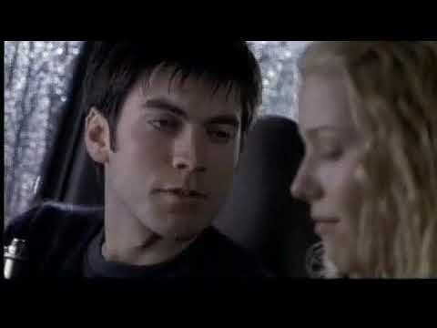 Soul Survivors (2001) trailer still: Cassie alone under blue club light just before the crash