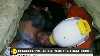 Download lagu Rescuers extract man from rubble in Palu, Sulawesi mp3