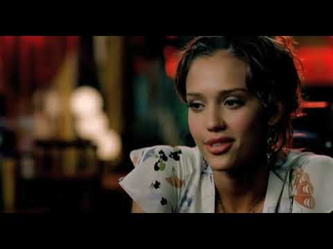 Honey trailer frame showing a music-video set with colored lights and dancers on risers