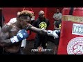 JERMALL CHARLO WRECKS HEAVY BAG WITH POWER PUNCH COMBINATIONS TO THE BODY DURING WORKOUT