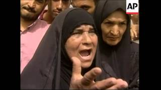 VOICER  Scuffles as first payments are made since war