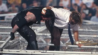 The Undertaker throws Mankind off the top of the H