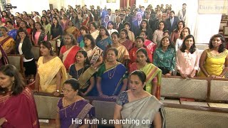 Download lagu 'Mine Eyes Have Seen The Glory' by 250 Voice  Mass Choir for Classic Hymns album ' Our God Reigns' mp3