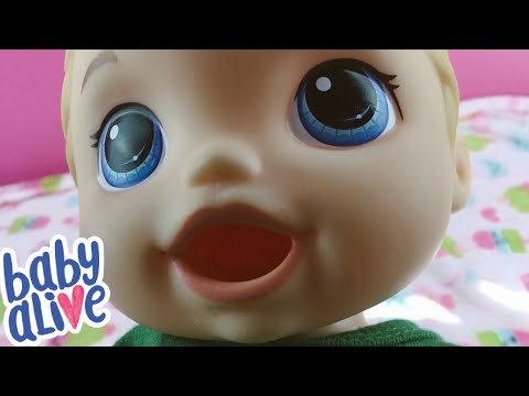 Zoe Feeding Baby Alive Super Snackin Luke Doll
