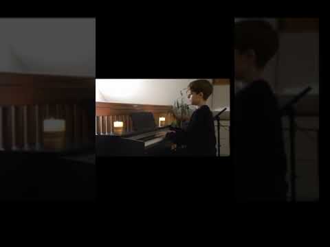 andrija cikic playing the piano